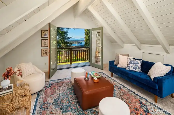 Loft space enjoys great views of Sound and Olympic Mountains. Watch the ferries come and go!