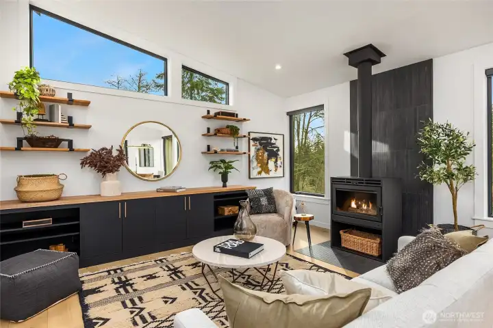 The built-in cabinetry features a countertop milled from a maple tree on the property.