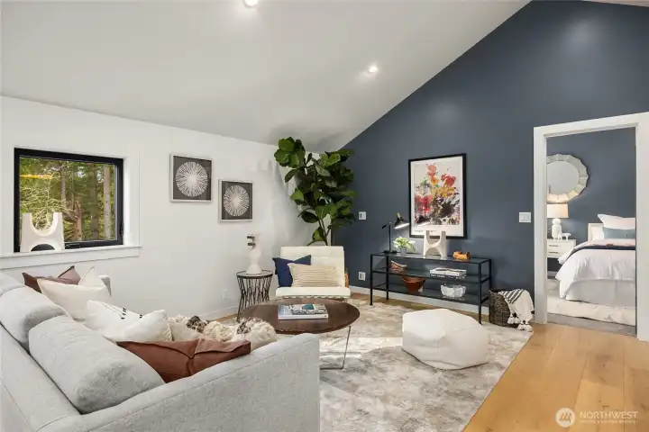 Vaulted ceilings upstairs make the home feel light and airy.