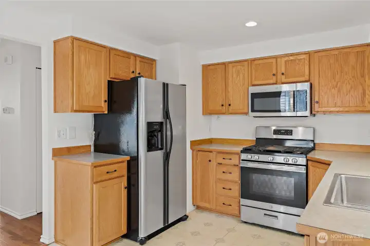 Refrigerator with cold water and ice maker.