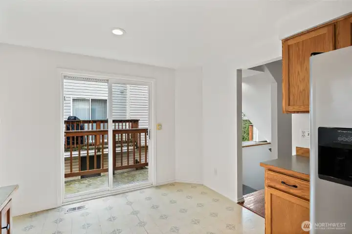 Deck great for container gardening and letting in the fresh air (also air vents in top of sliding glass door).