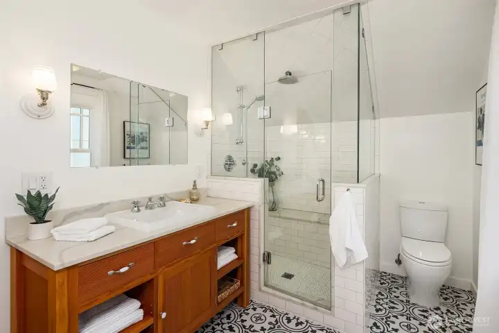 Huge, beautiful bathroom upstairs.