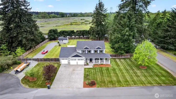 Beautiful 4 bedroom 2-story home located on an acre lot in the gated community of Castle Pines!