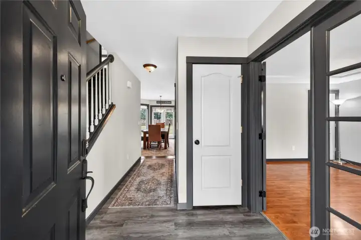 The home features a covered front porch, entry closet, French doors leading to the Den and more!