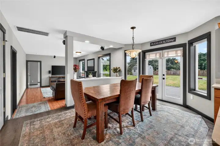 Dining area located just off the kitchen offers the perfect setting for everyday meals or entertaining, with easy access to the backyard and expansive patio for seamless indoor/outdoor living.