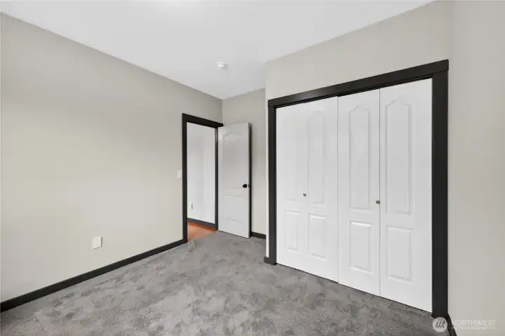 The second and third bedrooms are located on the second floor and have easy access to the main bathroom.