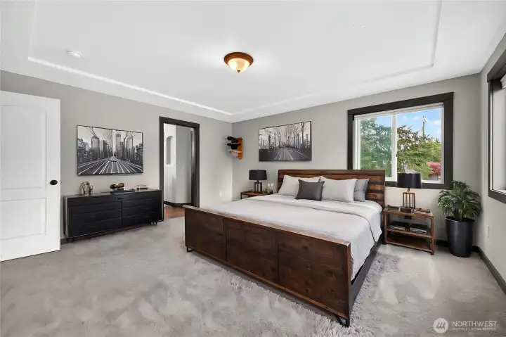 Virtually staged primary suite.