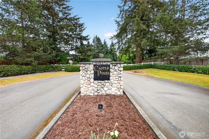 Located on a beautifully maintained corner lot within a gated community of attractive, well-kept homes.