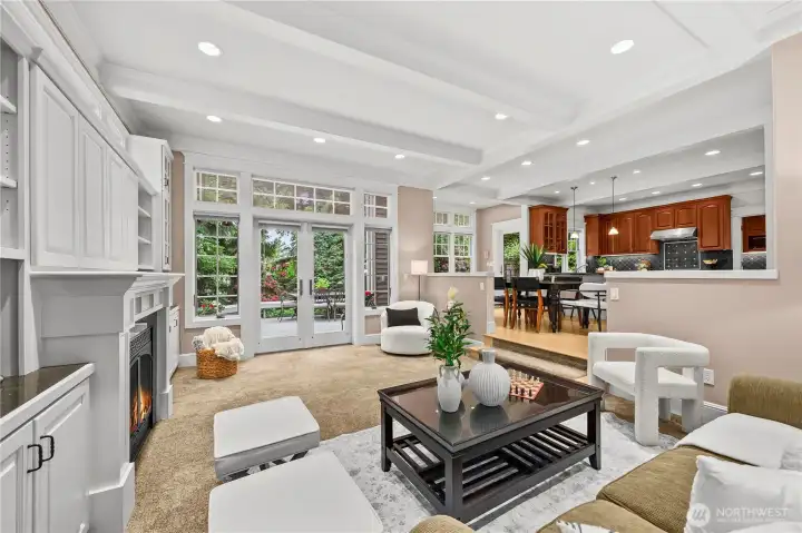 Family room flows from the main entry then opens to the dining and kitchen.