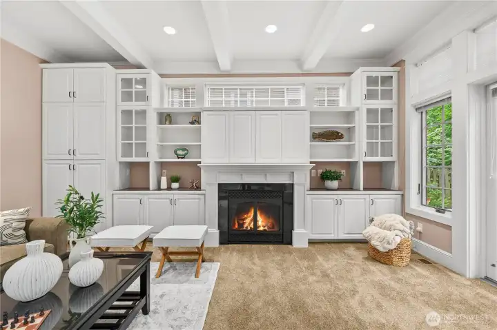 Built-ins with a hidden TV nook makes this living room a classy, yet cozy place to spend your time.
