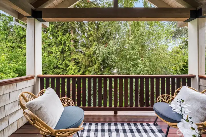 Enjoy fresh air morning and night from your private balcony. Peek a boo views to the water through these trees especially in the winter months.