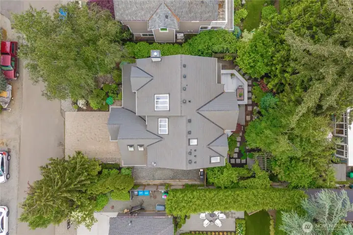 Spacious lot with ample parking, garden space, and room to enertain and relax this summer.