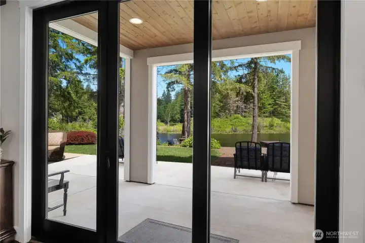 Patio doors are maestic and walk into the covered deck for year round enjoyment.