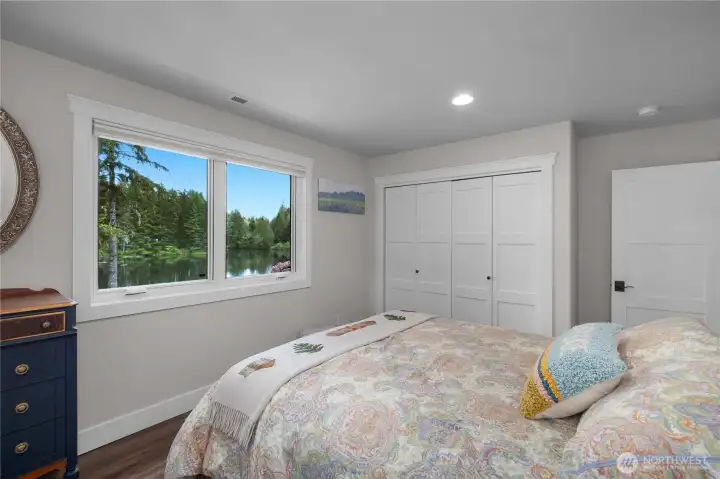 Bedroom 3 looks to the lakeside.