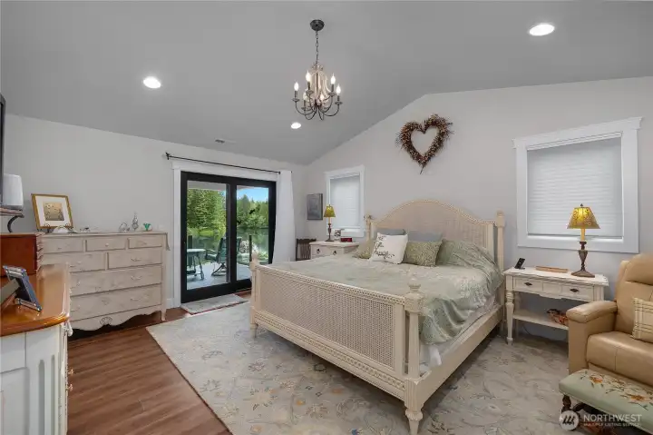 Primary suite - vaulted ceilings, romeo and juliet balcony.