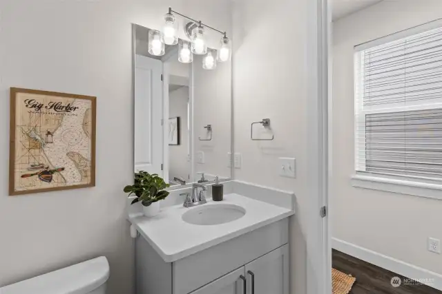 You will find a powder room conveniently located off the great room on the main level of this home.