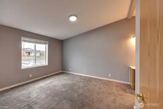 Primary Suite with walk in closet, primary bath and lighted make up vanity table