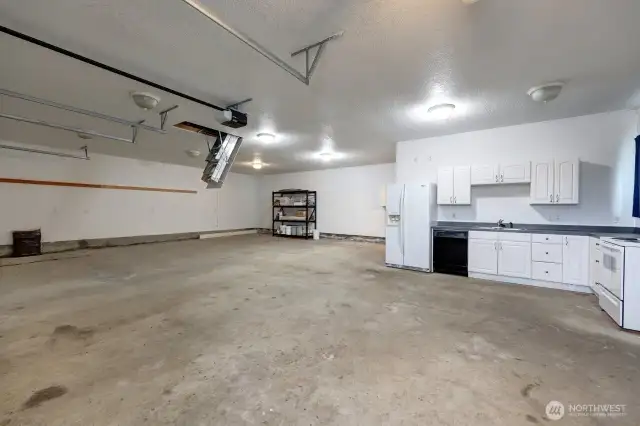Full kitchen and bath in this oversized garage with plenty of extra storage in the attic.