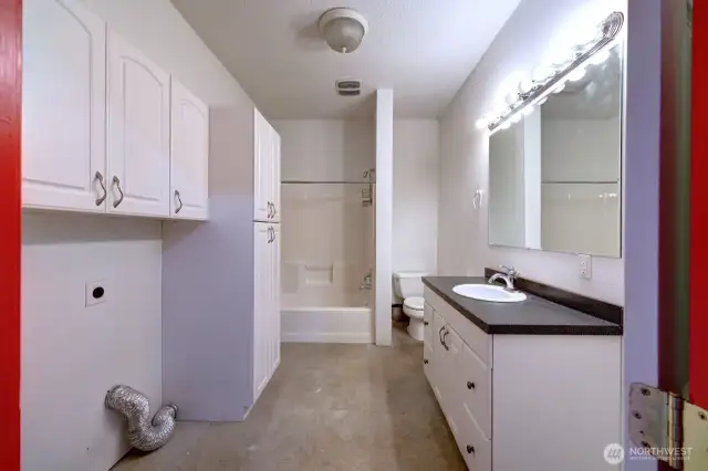 Full kitchen and bath in this oversized garage with plenty of extra storage in the attic. Notice the extra laundry hook ups.
