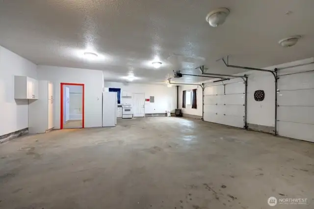 Full kitchen and bath in this oversized garage with plenty of extra storage in the attic.
