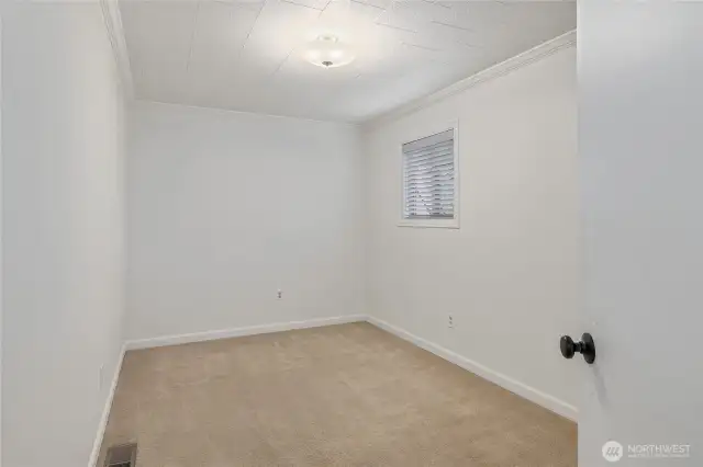 Laundry room with stairs to 3rd bedroom
