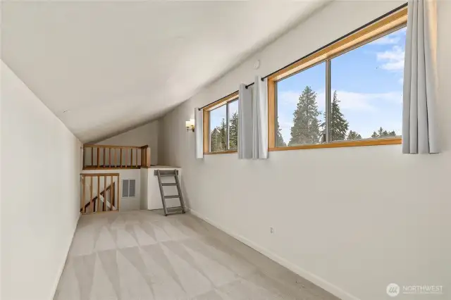 3rd bedroom upstairs is so bright would also make a great studio or home office.