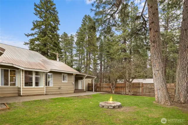 Fully fenced backyard is spacious and faces south for so much sun!