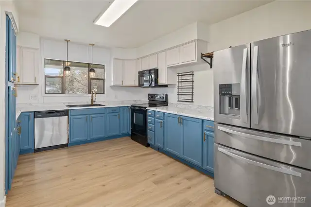 Spacious kitchen, you could add an island! Use your imagination!