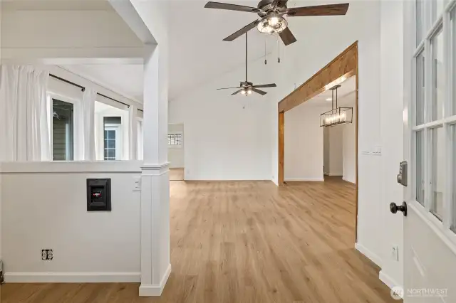 The nook off to the left could be a great home office or coffee bar!