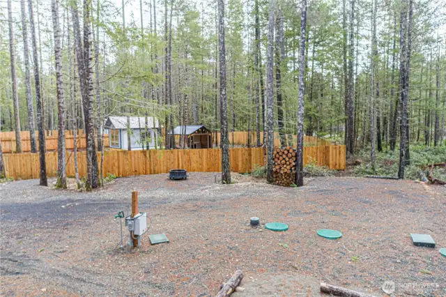 The abundance of usable space this lot offers provides plenty of room for a variety of activities. The level, cleared area is perfect for setting up an RV, outdoor seating, or recreational activities, while still maintaining a peaceful and private atmosphere surrounded by natural beauty.