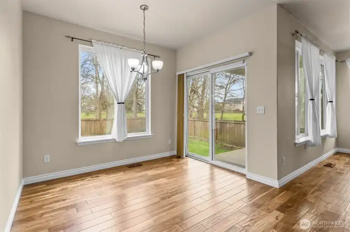 Indoor comfort meets outdoor calm, just beyond the sliding glass door.