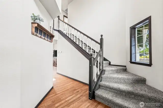 Vaulted ceilings and inviting entryway