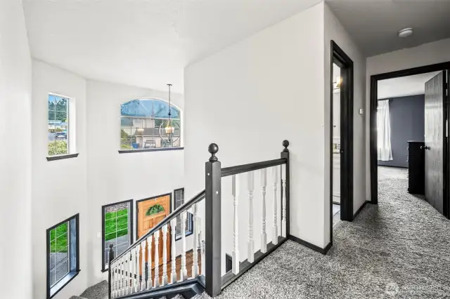 From the top of the stairs to the left is the full bathroom, straight down the hall is the primary suite