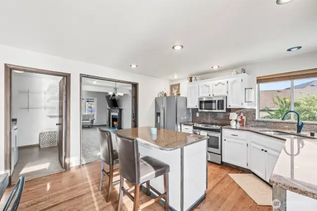 Don't miss the laundry room/pantry to the left