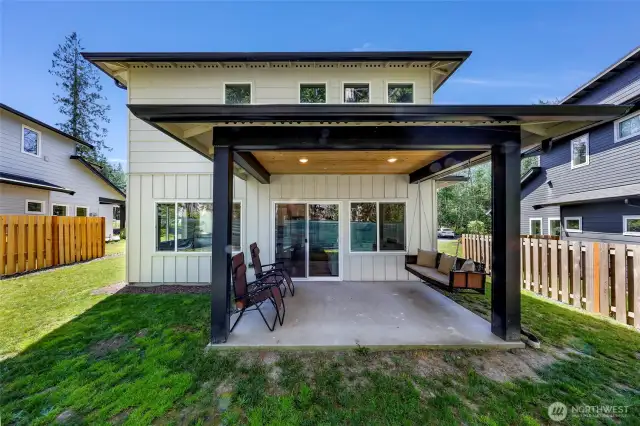 Covered back patio with access directly from the living room for easy entertaining