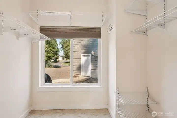 Walk-in closet off bathroom in second ensuite features "natural lighting" if you desire