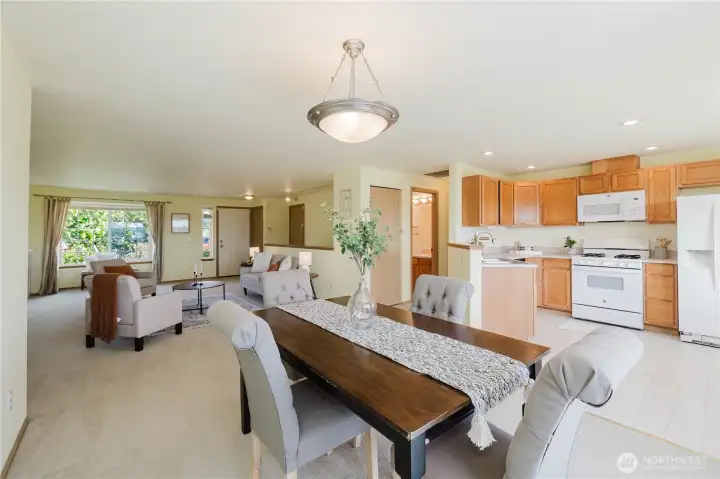 Dining room, kitchen and living room.