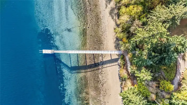 Aerial view of dock and beach. Not just for boaters or water play - the walk to it is beautiful, great exercise and a break at the end is breathtaking Aerial view of dock and beach. Not just for boaters or water play - the walk to it is beautiful, great exercise and a break at the end is breathtaking