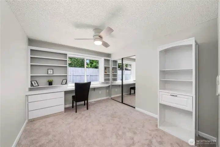 Guest room with built-in desk