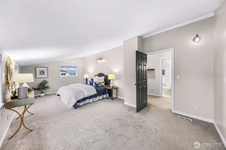 Large primary upstairs with plenty of room for king size bed and other furniture.