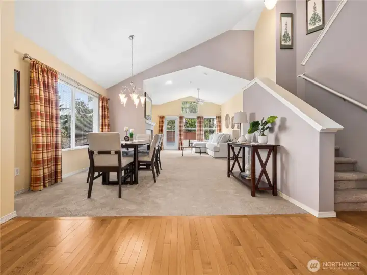 Upon entry, you'll find a nice flow from the dining area into the living room, making it perfect for everyday living or having people over, and the soft, neutral tones keep everything feeling warm and welcoming. ( - With the kitchen behind us.)