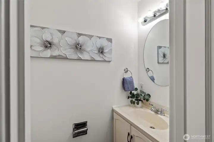 Primary en suite half bath.