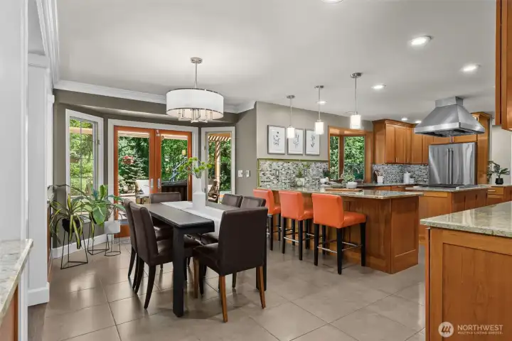 Dining area opens directly to the deck for seamless indoor/outdoor flow