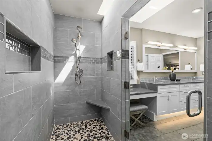Primary bathroom features luxurious oversized shower