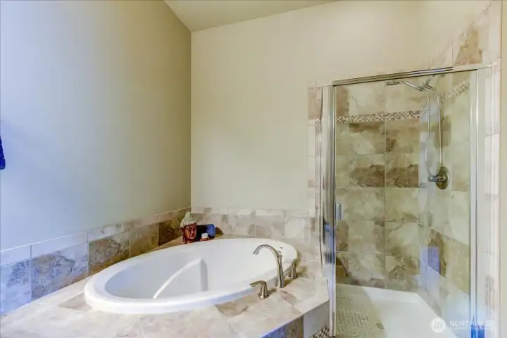 Primary Bathroom with Tiled Tub & Shower