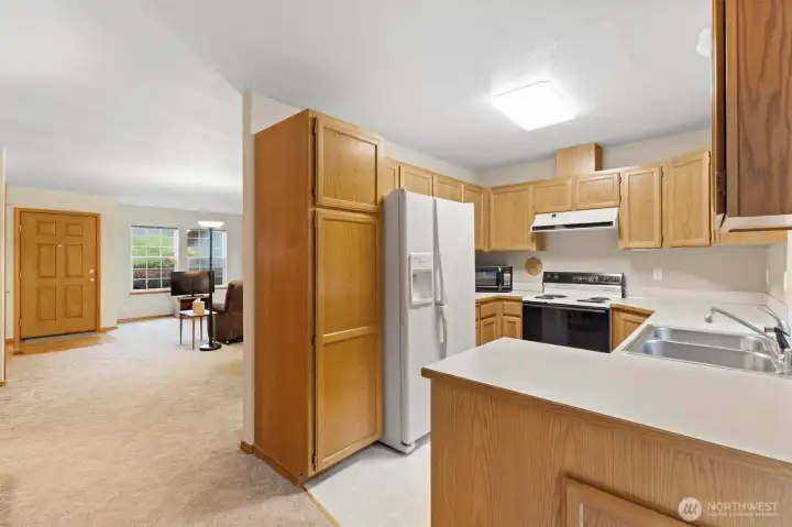 Kitchen feels open despite being tucked away in the back of the house Kitchen feels open despite being tucked away in the back of the house