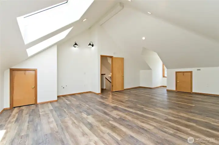 upstairs media room with plumbing for Kitchenette