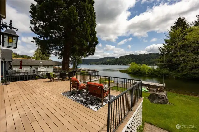 Just look at this gorgeous lake frontage on Summit Lake with protected area for swimming, floating, fishing...or skiing from your private dock!