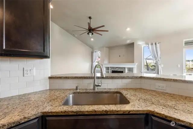 Kitchen overlooking the living and dining room