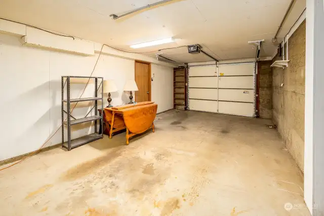 Super deep, secure and dry garage with entry into the lower level.